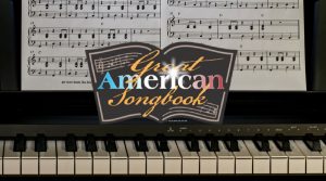 keyboard with music and panel saying The Great American Songbook